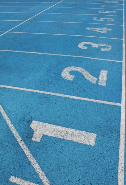 stock image Lanes of a blue race track of numbers