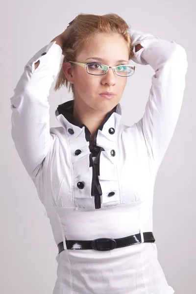 Girl in a suit and glasses — Stock Photo, Image