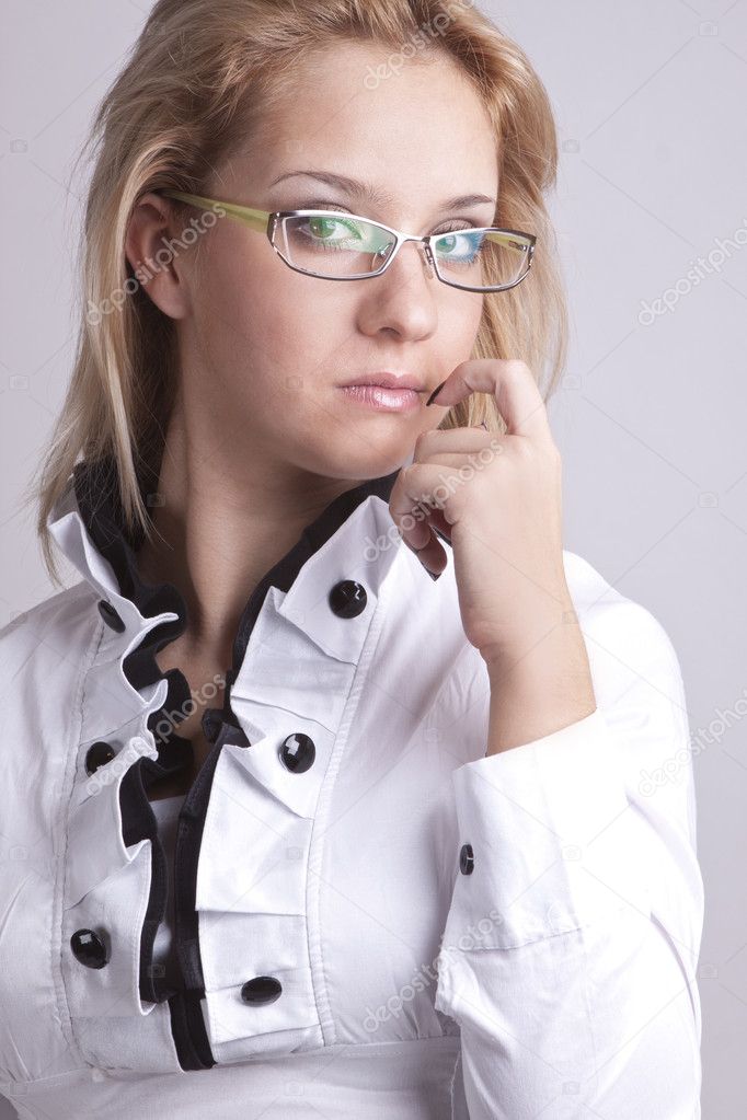 Girl in a suit and glasses