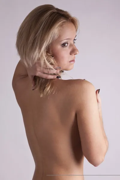 Chica bonita con la espalda desnuda —  Fotos de Stock