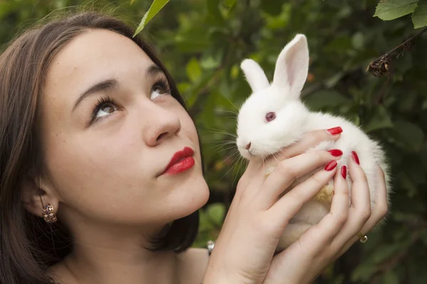 stock image Beautiful girl with a rabbit