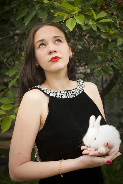 stock image Beautiful girl with a rabbit
