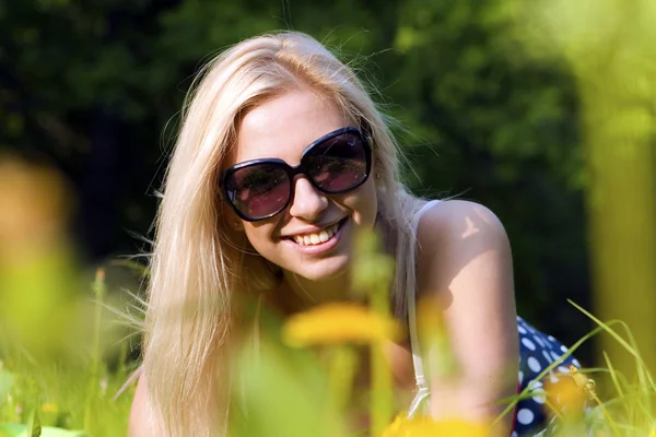 Blonde girl on nature background — Stock Photo, Image