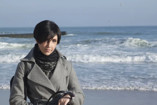 stock image Brunette woman near the sea