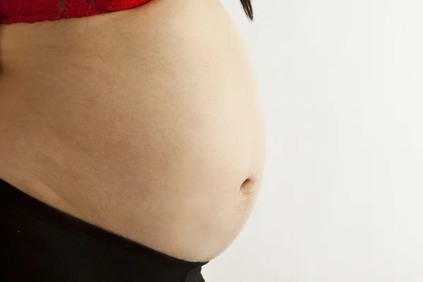 妊娠中の女性の腹の終わり — ストック写真