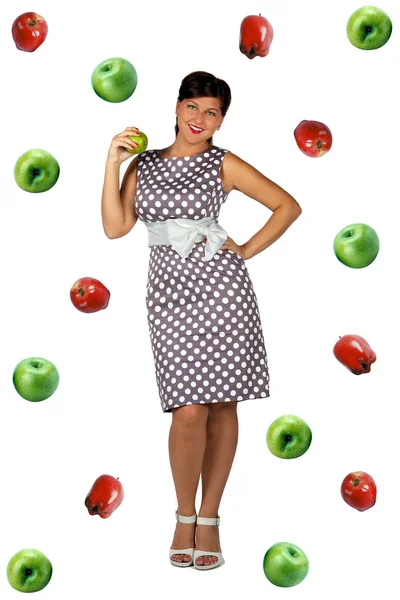 Ретро девушка на фоне яблок — стоковое фото