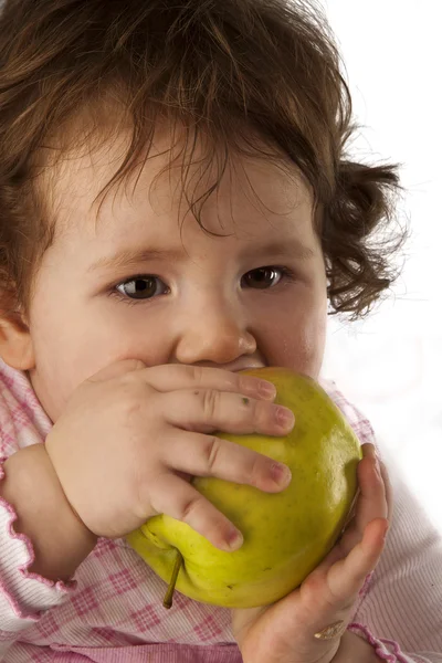 Girl eating apple — Stock Photo, Image