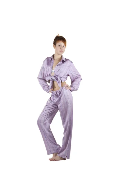 Beautiful girl in grey pajamas, full length, white background — Stock Photo, Image
