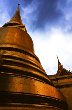 Pagoda in a temple thailand clipart