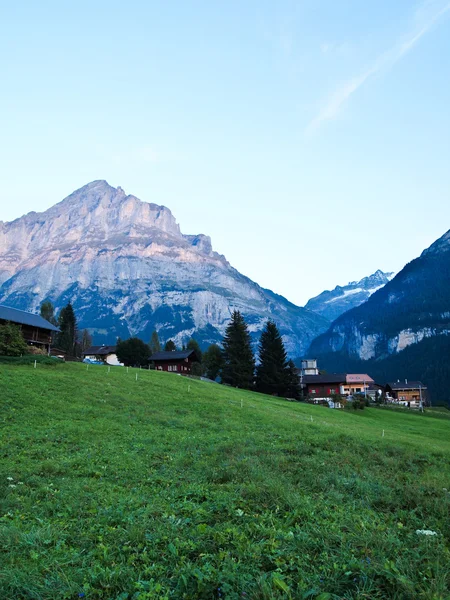 Swiss village view with Jungfrau on the background — Stock Photo, Image