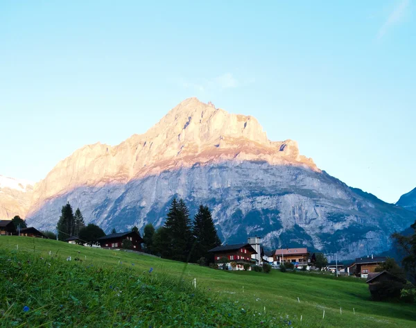 Swiss village view with Jungfrau background — Stock Photo, Image