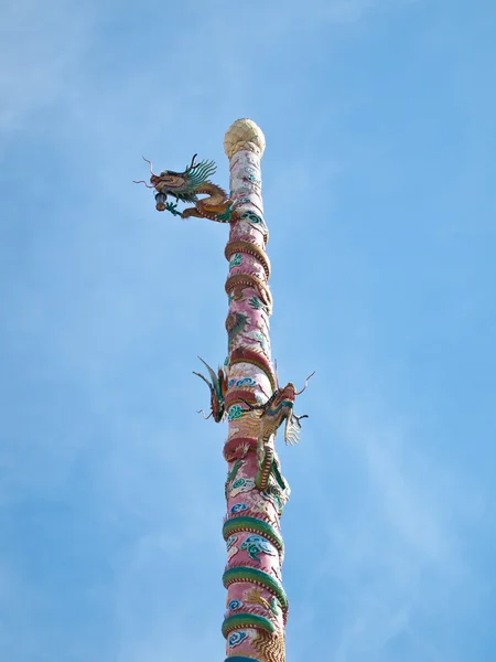 stock image Chinese dragon pillars with blue sky on background