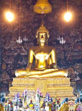 The golden buddha at Wat Suthat Bangkok , Thailand clipart