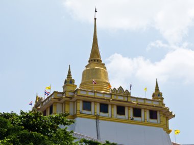 Golden pagoda on the top of Wat Saket , Bangkok Thailand clipart