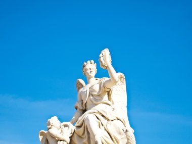 Statue at facade of Versailles Chateau entrance clipart