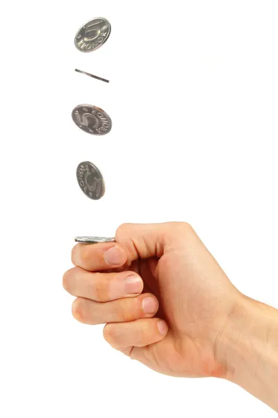 Mão lançando uma moeda — Fotografia de Stock