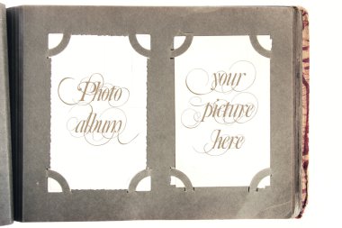 Old photo album with space for your pictures or text clipart