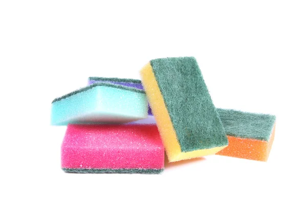 Esponjas coloridas isoladas sobre fundo branco — Fotografia de Stock