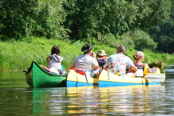 Three canoe boats on river — Stock Photo, Image