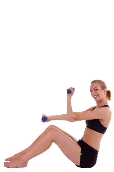 A young woman with dumbbells — Stock Photo, Image