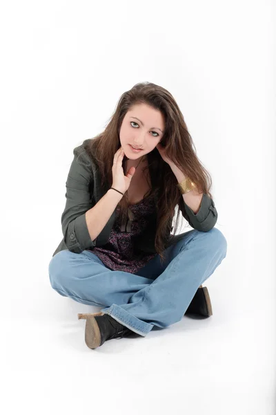 Young brunette teenager girl in studio — Stock Photo, Image