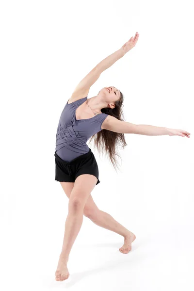 Fiatal táncoló nő kékben — Stock Fotó