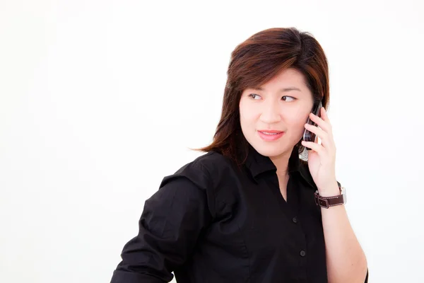 Азиатка с телефоном — стоковое фото