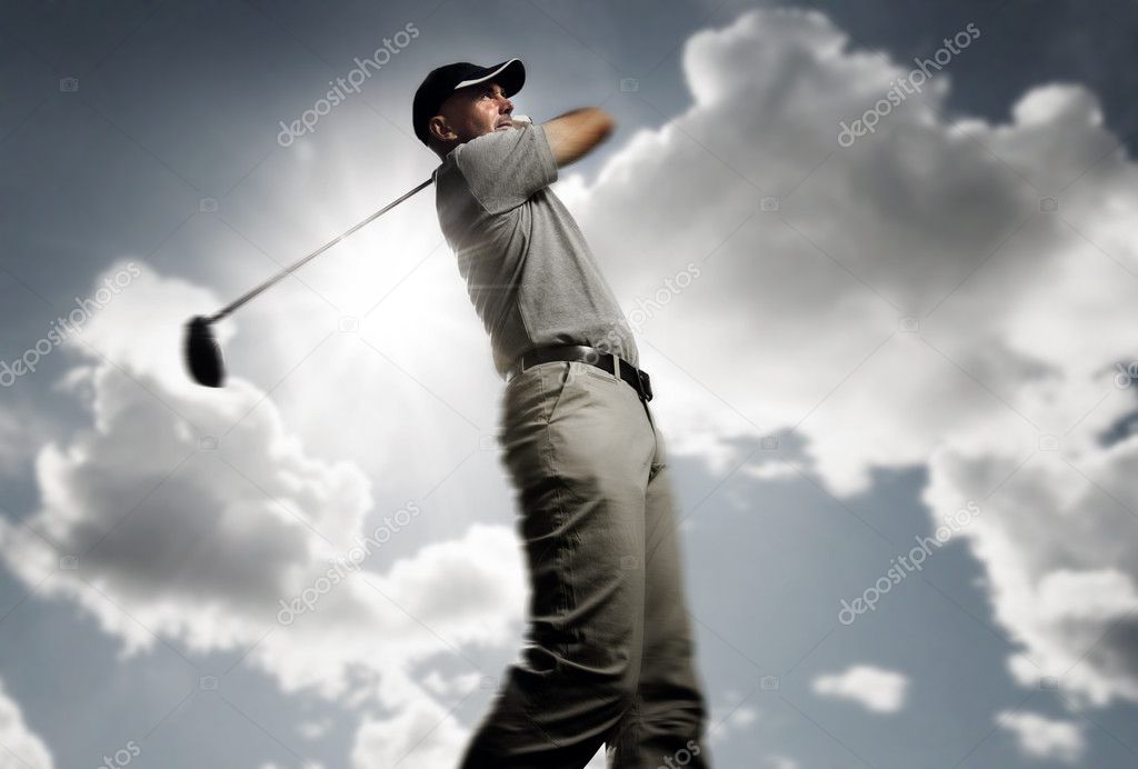Golfer shooting a golf ball