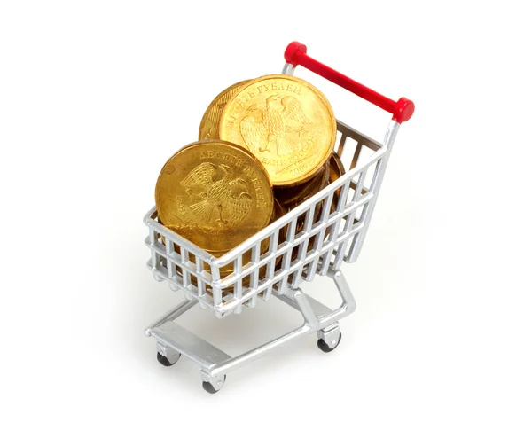 Monedas de oro en el carrito Fotos de stock libres de derechos