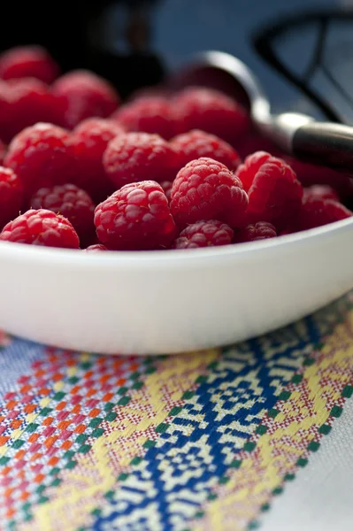 Fresh raspberries with pattern bacground — Stock Photo, Image
