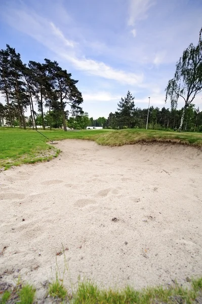 Песок на поле для гольфа — стоковое фото