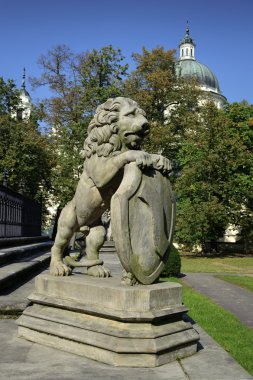 Lion sculpture in Wilanow clipart