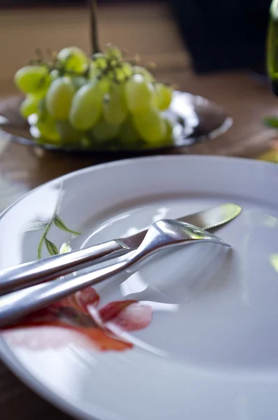 stock image Empty dinner plate with cutlery