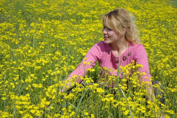 Girl on spring meadow — Stock Photo, Image