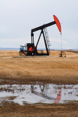 Pumpjack in northern Alberta, Canada clipart