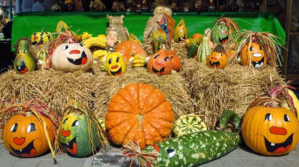 Cute arrangement of painted pumpkins — Stock Photo, Image