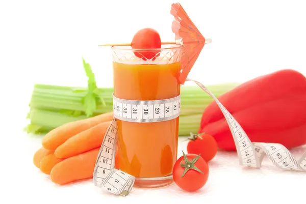Vegetable cocktail with tape measure — Stock Photo, Image