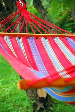 Hammock in the garden clipart