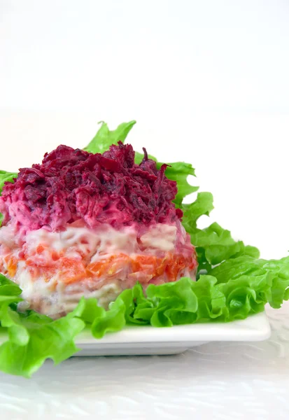 stock image Russian vegetable salad with herring