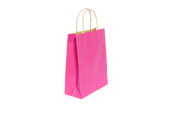 Różowy torba papierowa gotowy na zakupy, na białym tle — Zdjęcie stockowe