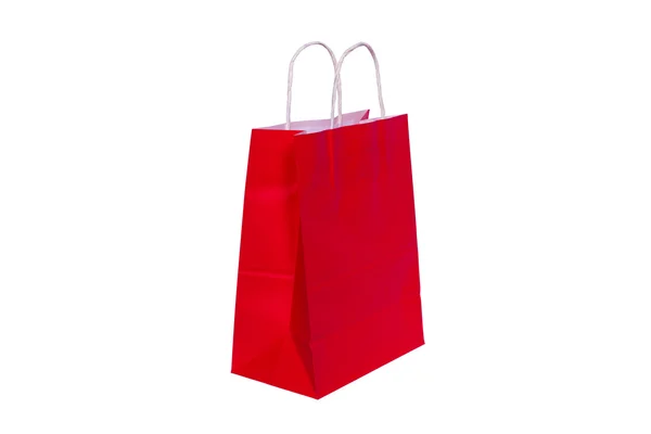 Beyaz zemin üzerine kırmızı kağıt çanta alışveriş için hazır izole — Stok fotoğraf