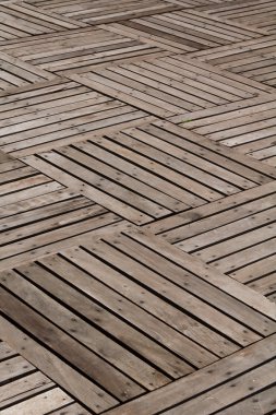 Patterns and textures of a wooden planks pavement clipart