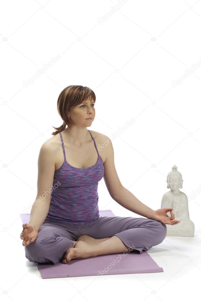 Young early pregnant woman meditating 2