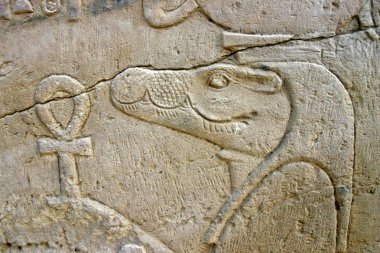 Wall of relief of the Crocodile God Sobek in Egypt clipart