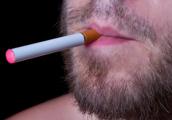Elektronische Zigarette im Mund Stockfoto
