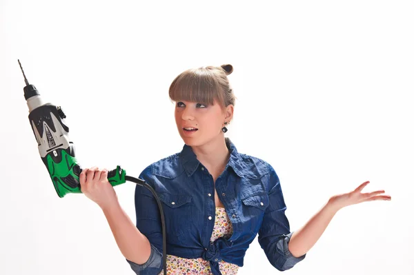 Girl with a drill — Stock Photo, Image