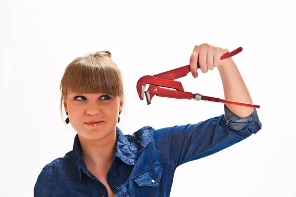 Girl with a spanner — Stock Photo, Image