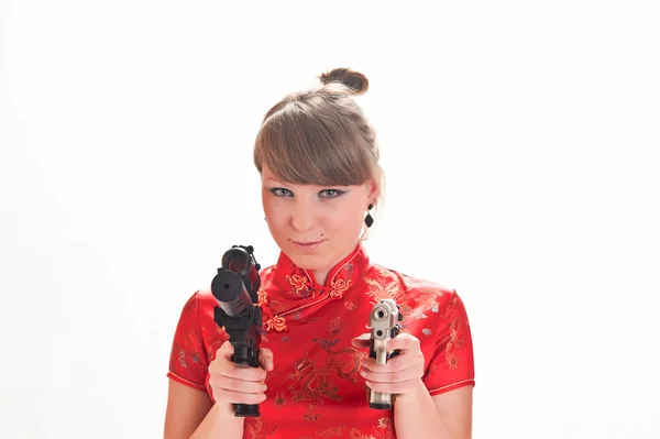 Armado con una chica pistola — Foto de Stock