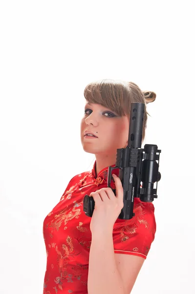 Armado con una chica pistola — Foto de Stock