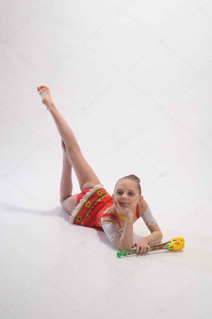 Young girl doing gymnastics Stock Photo by ©evdoha 5476240